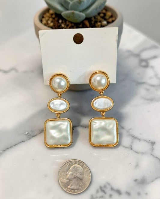 Gold trim pearl earrings